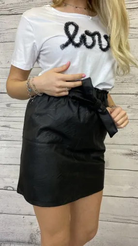 Black faux leather skirt with ruffled waistband