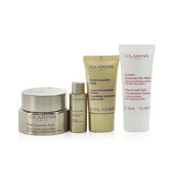 Clarins Nutri-Lumiere Collection: Day Cream 50ml, Night Cream 15ml, Treatment Essence 10ml, Hand & Nail Treatment Cream 30ml