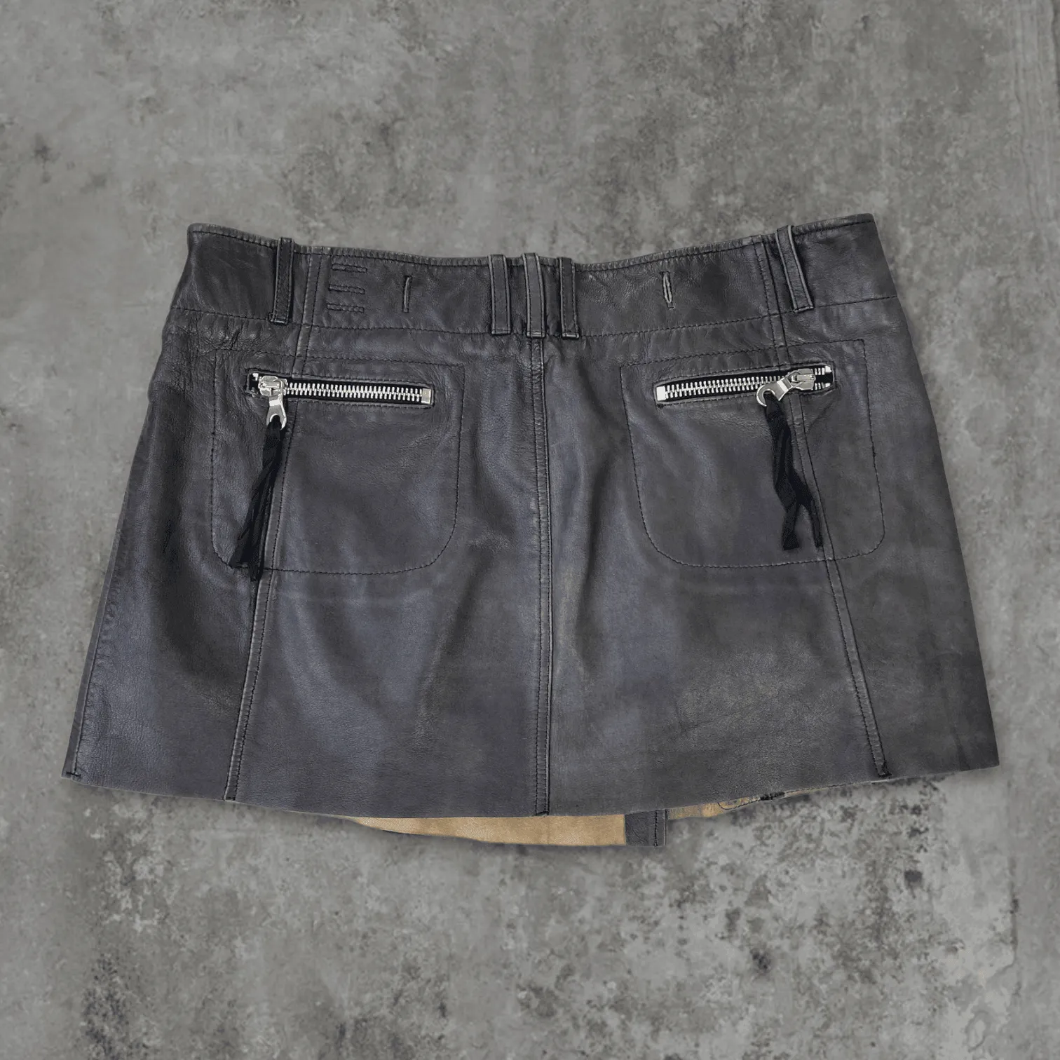 W32 LEATHER WRAP MINI SKIRT by DIESEL