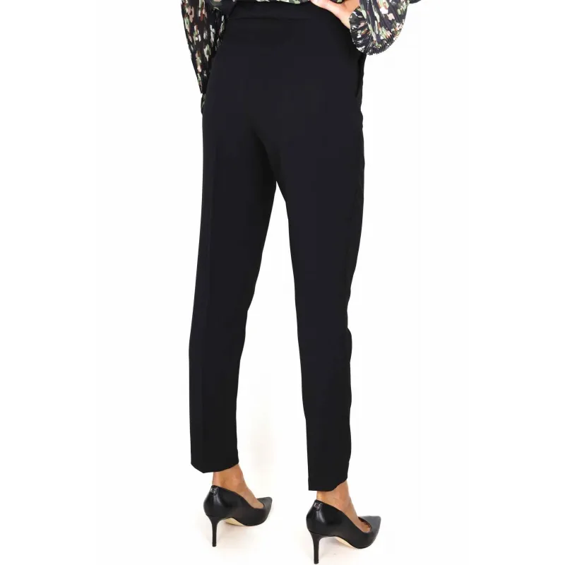 High-waisted black pants with jewel buckle